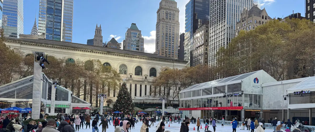 Skaters on the ice at Bryant Park's Winter Village in New York City, December 2024
