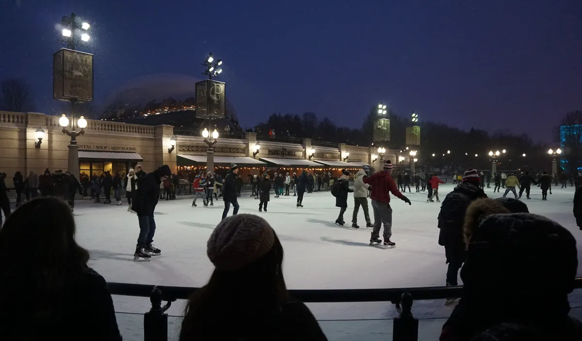 Skaters on the McCormick Tribune Ice Rink at Millennium Park in Chicago at night, December 2017
