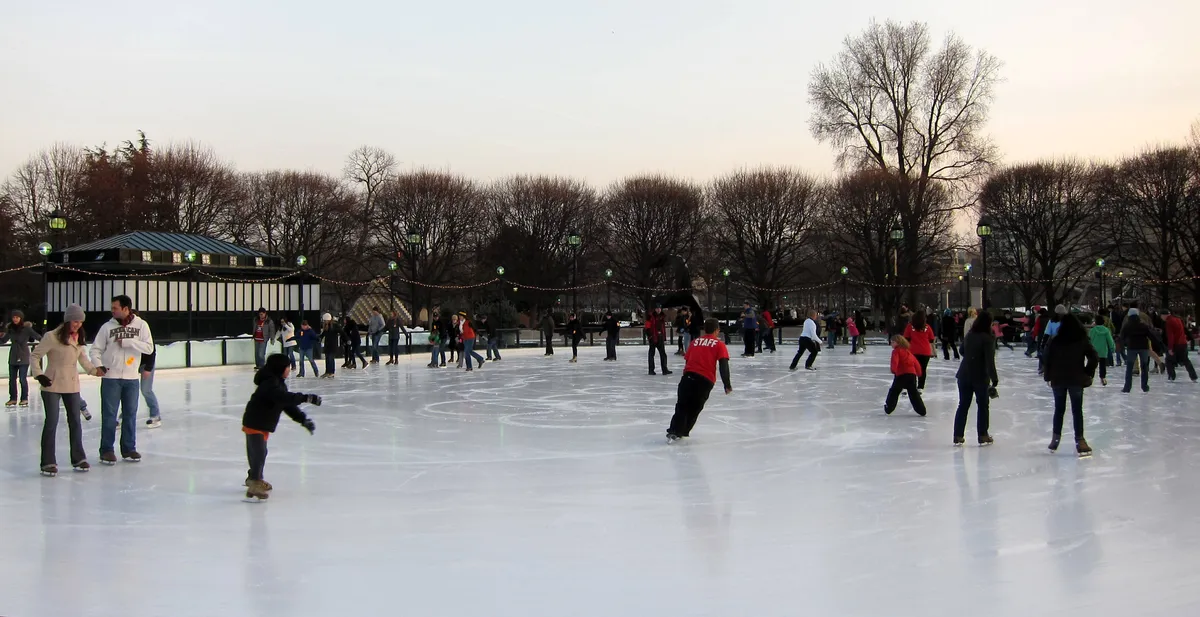 Skaters at the National Gallery of Art Sculpture Garden ice rink in Washington, DC